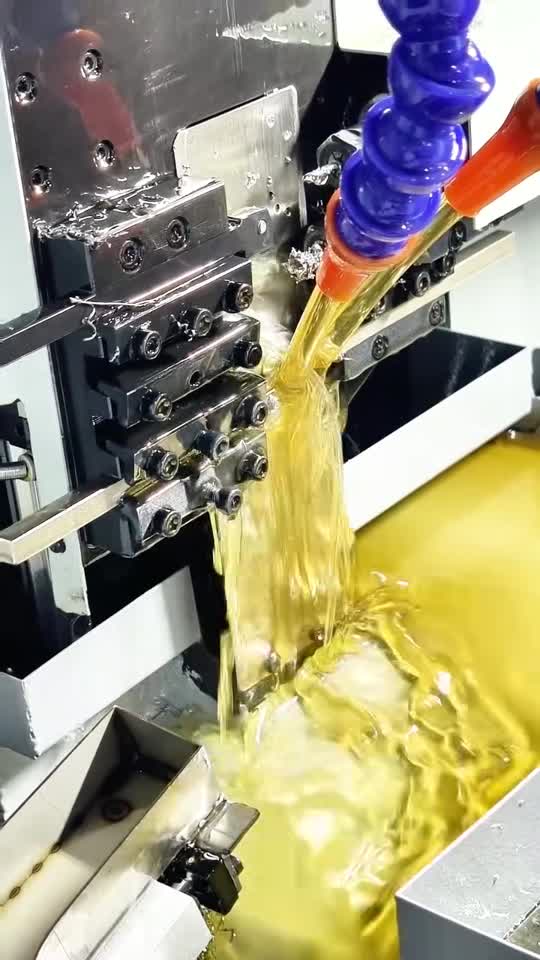 Live Swiss-type CNC lathe cutting process under coolant